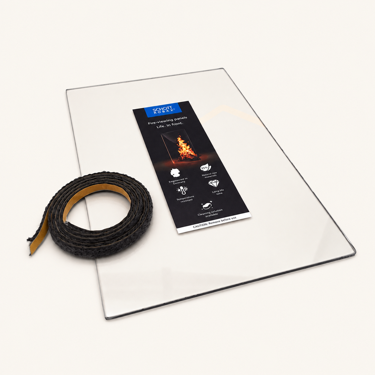 Replacement stove glass with a coiled glass gasket on a warm white background